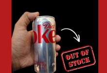 Man Holding a Diet Cock Showing Diet Coke Shortage in India