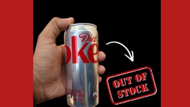 Man Holding a Diet Cock Showing Diet Coke Shortage in India